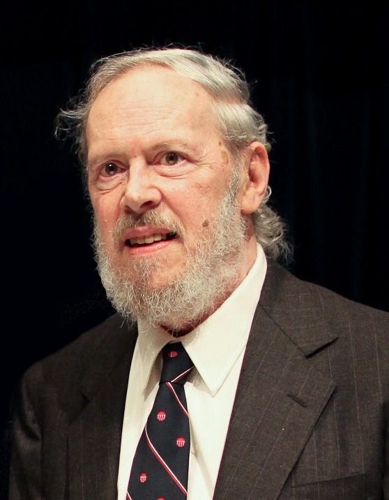 Dennis Ritchie, con barba y traje, en 2011